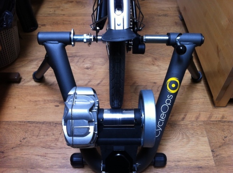 The rear wheel clamps into the turbo trainer in the normal way
